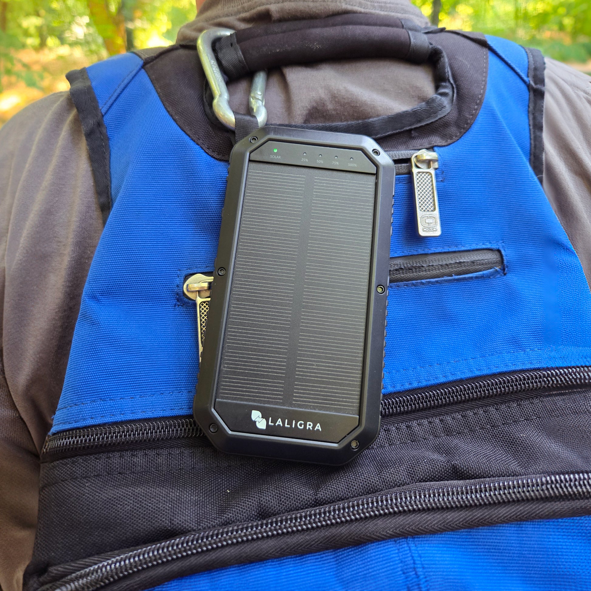 Laligra 10,000 mAh Power Bank attached to the backpack of a hiker